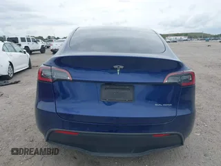 2022 Tesla Model Y Long Range z VIN 7SAYGDEE9NA002493, wystawiony jako IAAI lot #41756460 z przebiegiem 68 315 mil mil oraz . Historia ofert i sprzedaży dostępna na DreamBid. Obrazek 15.