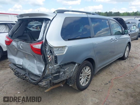 2015 Toyota Sienna XLE with VIN 5TDYK3DC9FS532310, listed as a IAAI auction lot 41990553 with 75,133 mi miles and . Bid and sale history available at DreamBid. Image 4.