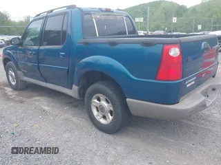 2001 Ford Explorer Sport Trac z VIN 1FMZU77E11UC71161, wystawiony jako IAAI lot #42184342 z przebiegiem 196 240 mil mil oraz . Historia ofert i sprzedaży dostępna na DreamBid. Obrazek 3.