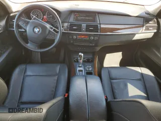 2012 BMW X5 35i with VIN 5UXZV4C5XCL987618, listed as a Copart auction lot 60308965 with 98,195 mi miles and Salvage title. Bid and sale history available at DreamBid. Image 8.