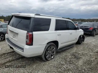 2015 GMC Yukon Denali with VIN 1GKS1CKJ1FR526594, listed as a Copart auction lot 46524205 with 99,095 mi miles and Salvage Title. Bid and sale history available at carsss.com. Image 3.