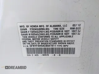 2012 Honda Pilot EX-L with VIN 5FNYF4H54CB041911, listed as a IAAI auction lot 41968540 with 124,646 mi miles and . Bid and sale history available at DreamBid. Image 9.