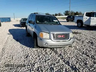 2009 GMC Envoy SLE with VIN 1GKDS33S492129469, listed as a Copart auction lot 83232024 with 131,735 mi miles and Salvage Title. Bid and sale history available at carsss.com. Image 12.