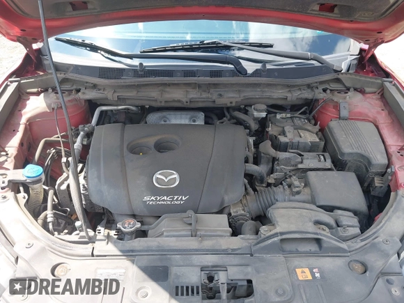 2015 Mazda CX-5 Sport with VIN JM3KE4BY5F0502121, listed as a IAAI auction lot 42652276 with 192,462 mi miles and . Bid and sale history available at DreamBid. Image 10.
