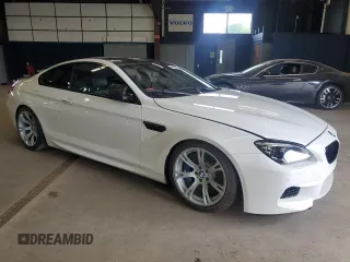 2014 BMW M6 z VIN WBSLX9C58ED160480, wystawiony jako Copart lot #64464985 z przebiegiem 58 514 mil mil oraz Czysty tytuł • Clean title. Historia ofert i sprzedaży dostępna na DreamBid. Obrazek 4.