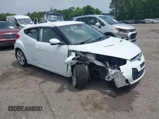 2012 Hyundai Veloster w/Gray Int z VIN KMHTC6AD6CU026944, wystawiony jako IAAI lot #42216988 z przebiegiem 61 147 mil mil oraz . Historia ofert i sprzedaży dostępna na DreamBid. Obrazek 1.