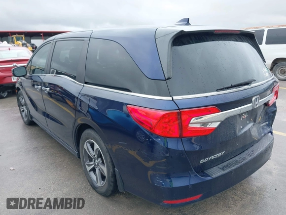 2018 Honda Odyssey Touring with VIN 5FNRL6H85JB001501, listed as a IAAI auction lot 41911497 with 92,407 mi miles. Bid and sale history available at carsss.com. Image 3.