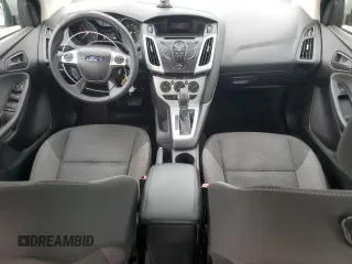 2012 Ford Focus SE with VIN 1FAHP3F2XCL202510, listed as a Copart auction lot 64066545 with 77,828 mi miles and Salvage title. Bid and sale history available at DreamBid. Image 8.