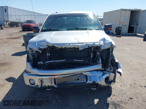2014 Ford F-150 XL z VIN 1FTFW1ET9EKD60431, wystawiony jako IAAI lot #41994685 z przebiegiem 125 755 mil mil oraz . Historia ofert i sprzedaży dostępna na DreamBid. Obrazek 13.