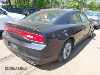 2012 Dodge Charger SE with VIN 2C3CDXBGXCH298176, listed as a IAAI auction lot 42138725 with 128,717 mi miles. Bid and sale history available at carsss.com. Image 4.