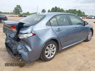 2021 Toyota Corolla LE with VIN JTDEPMAE8MJ162896, listed as a IAAI auction lot 41942669 with 99,131 mi miles. Bid and sale history available at carsss.com. Image 4.