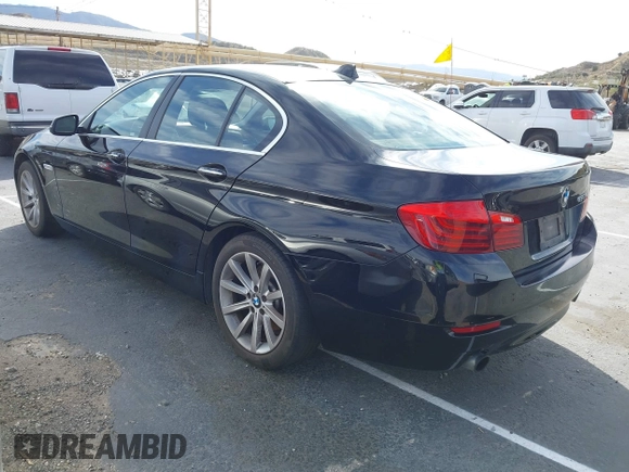 2014 BMW 5 Series 535i with VIN WBA5B1C54ED476763, listed as a IAAI auction lot 41590236 with 115,048 mi miles and . Bid and sale history available at DreamBid. Image 3.