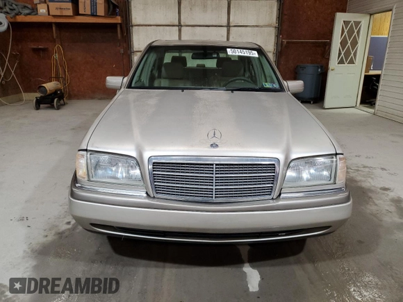 1995 Mercedes-Benz C with VIN WDBHA28E8SF115598, listed as a Copart auction lot 50145195 with 129,134 mi miles and Clean Title. Bid and sale history available at carsss.com. Image 5.