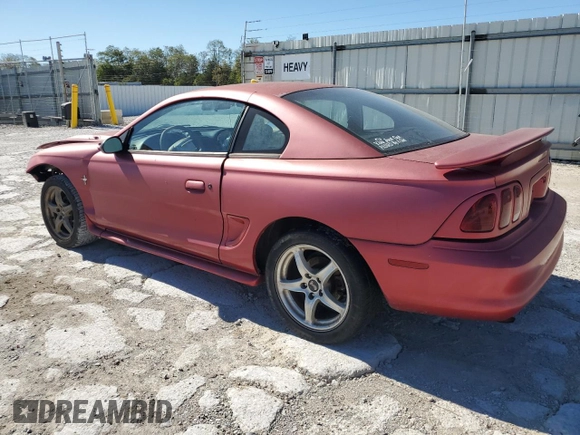 1997 Ford Mustang with VIN 1FALP4043VF109078, listed as a Copart auction lot 74601704 with 133,838 mi miles and Salvage Title. Bid and sale history available at carsss.com. Image 2.