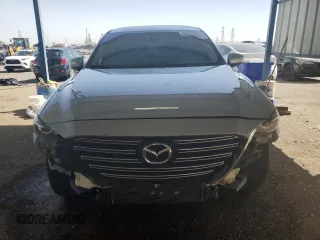 2017 Mazda CX-9 Touring с VIN JM3TCACY0H0141939, выставлен на аукционе Copart как лот 42557375 с пробегом 105 985 миль миль и Списание • Salvage title. История ставок и продаж доступна на DreamBid. Изображение 5.