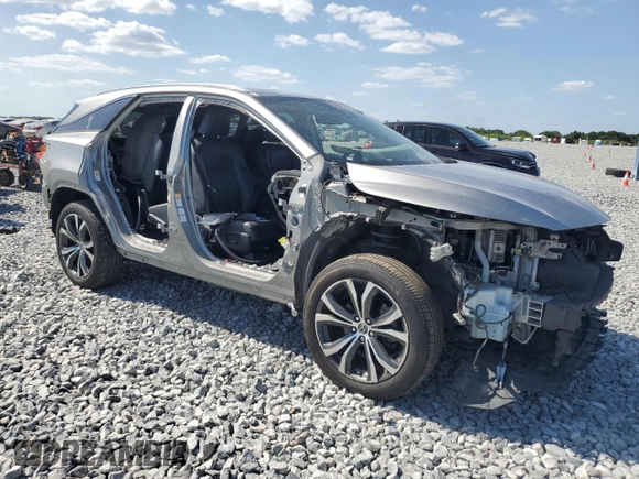 2018 Lexus RX 450hL Premium with VIN JTJDGKCAXJ2004427, listed as a Copart auction lot 55213625 with 94,557 mi miles and Salvage title. Bid and sale history available at DreamBid. Image 4.