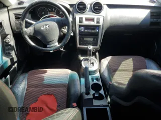 2006 Hyundai Tiburon GT z VIN KMHHN65F26U225506, wystawiony jako Copart lot #56997285 z przebiegiem 170 175 mil mil oraz Szkody całkowita. Historia ofert i sprzedaży dostępna na DreamBid. Obrazek 8.