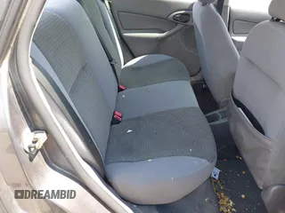 2004 Ford Focus SE with VIN 1FAFP34334W177338, listed as a IAAI auction lot 42003202 with 190,581 mi miles and . Bid and sale history available at DreamBid. Image 8.