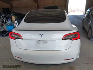 2021 Tesla Model 3 Long Range with VIN 5YJ3E1EB1MF852881, listed as a IAAI auction lot 41643234 with 92,346 mi miles. Bid and sale history available at carsss.com. Image 16.