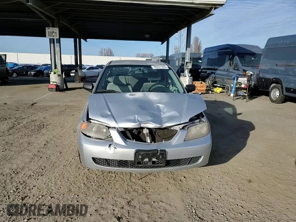 2002 Mazda Protege DX with VIN JM1BJ225120605237, listed as a Copart auction lot 49331225 with 184,556 mi miles and Salvage Title. Bid and sale history available at DreamBid. Image 11.