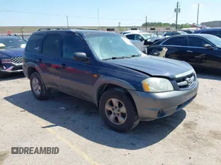 2003 Mazda Tribute LX with VIN 4F2CZ04133KM23234, listed as a IAAI auction lot 41869955 with 240,898 mi miles and . Bid and sale history available at carsss.com. Image 1.