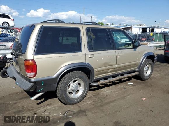 2000 Ford Explorer XLT z VIN 1FMDU83P1YZC26628, wystawiony jako Copart lot #69201664 z przebiegiem 219 384 mil mil oraz Nie do naprawy • Non repairable. Historia ofert i sprzedaży dostępna na DreamBid. Obrazek 3.