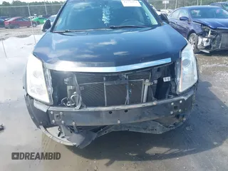 2014 Cadillac SRX Performance Collection с VIN 3GYFNFE38ES656510, выставлен на аукционе IAAI как лот 42336472 с пробегом 125 269 миль миль и . История ставок и продаж доступна на DreamBid. Изображение 6.