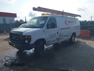 2014 Ford Econoline Cargo Commercial with VIN 1FTNS2EW7EDA04202, listed as a IAAI auction lot 42720940 with 167,356 mi miles and . Bid and sale history available at DreamBid. Image 2.