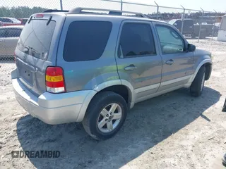 2007 Ford Escape Hybrid with VIN 1FMCU49H87KB34041, listed as a IAAI auction lot 42313413 with Not provided miles and . Bid and sale history available at DreamBid. Image 4.