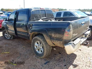 2013 Toyota Tacoma with VIN 3TMLU4EN3DM106670, listed as a IAAI auction lot 41696618 with 176,353 mi miles and . Bid and sale history available at DreamBid. Image 3.
