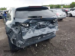 2023 Mazda CX-50 S Premium Plus z VIN 7MMVABEM6PN105424, wystawiony jako IAAI lot #42148825 z przebiegiem 40 434 mil mil oraz . Historia ofert i sprzedaży dostępna na DreamBid. Obrazek 6.