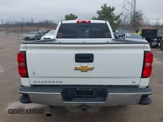 2014 Chevrolet Silverado 1500 LT with VIN 3GCUKREC6EG194197, listed as a IAAI auction lot 41999718 with 206,916 mi miles and . Bid and sale history available at DreamBid. Image 17.