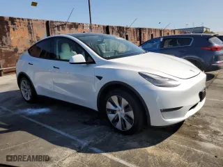 2021 Tesla Model Y Standard Range with VIN 5YJYGDED9MF163013, listed as a Copart auction lot 47807245 with 47,458 mi miles and Salvage Title. Bid and sale history available at carsss.com. Image 4.