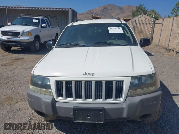2004 Jeep Grand Cherokee Laredo with VIN 1J4GX48SX4C151160, listed as a IAAI auction lot 42765441 with 176,179 mi miles and . Bid and sale history available at DreamBid. Image 6.