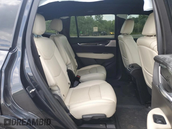 2021 Cadillac XT6 Sport z VIN 1GYKPGRS0MZ187818, wystawiony jako Copart lot #66967824 z przebiegiem 66 956 mil mil oraz Szkoda całkowita • Salvage title. Historia ofert i sprzedaży dostępna na DreamBid. Obrazek 11.