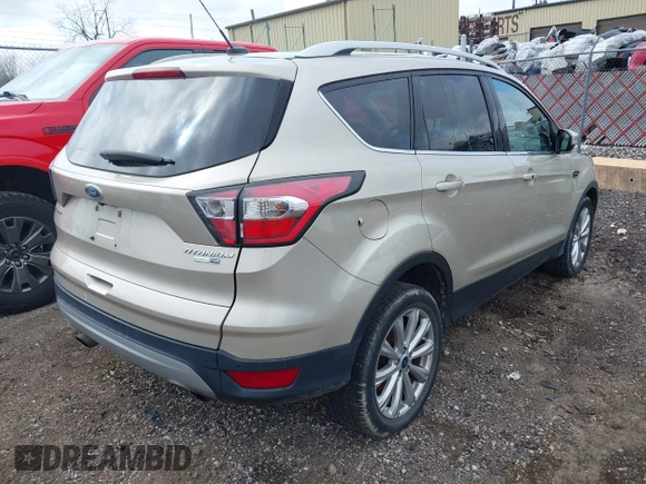 2017 Ford Escape Titanium with VIN 1FMCU9JD1HUB05881, listed as a IAAI auction lot 41966842 with 185,963 mi miles. Bid and sale history available at carsss.com. Image 4.