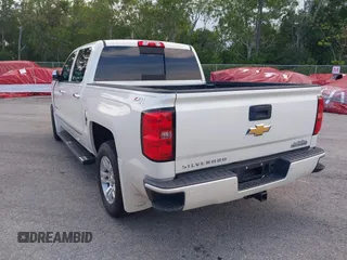 2014 Chevrolet Silverado 1500 High Country with VIN 3GCUKTEC4EG401571, listed as a IAAI auction lot 41984349 with 104,221 mi miles and . Bid and sale history available at DreamBid. Image 3.