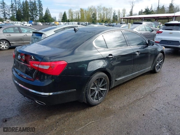 2014 Kia Cadenza Premium with VIN KNALN4D71E5132396, listed as a IAAI auction lot 41977031 with 114,714 mi miles. Bid and sale history available at carsss.com. Image 4.