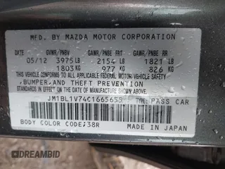 2012 Mazda 3 i Touring with VIN JM1BL1V74C1665655, listed as a IAAI auction lot 42261070 with 102,885 mi miles and . Bid and sale history available at DreamBid. Image 9.