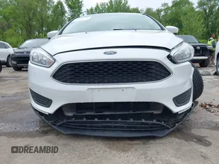 2018 Ford Focus SE with VIN 1FADP3F29JL223389, listed as a IAAI auction lot 42127707 with 87,145 mi miles and . Bid and sale history available at DreamBid. Image 12.