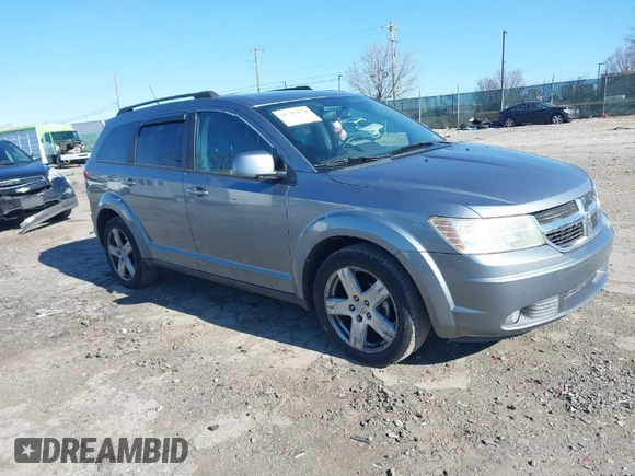 2010 Dodge Journey SXT with VIN 3D4PH5FVXAT107023, listed as a IAAI auction lot 41747572 with 165,568 mi miles and . Bid and sale history available at DreamBid. Image 1.