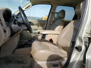 2003 Ford Escape XLT Popular 2 with VIN 1FMYU93143KC64939, listed as a Copart auction lot 75284884 with 147,352 mi miles and Salvage Title. Bid and sale history available at carsss.com. Image 7.
