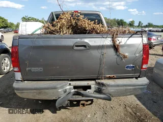 2003 Ford Super Duty F-250 XL with VIN 1FTNW21L33EC50476, listed as a Copart auction lot 67627394 with 277,849 mi miles and Salvage Title. Bid and sale history available at carsss.com. Image 6.