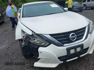 2016 Nissan Altima S with VIN 1N4AL3AP8GC211857, listed as a IAAI auction lot 41977716 with 234,952 mi miles and . Bid and sale history available at DreamBid. Image 6.
