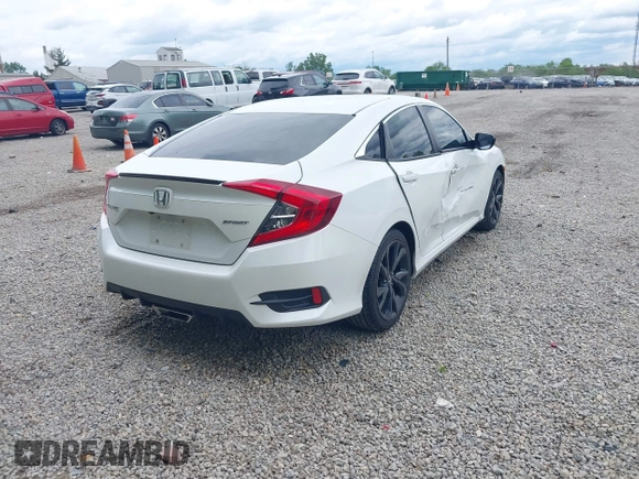 2019 Honda Civic Sport with VIN 19XFC2F85KE019311, listed as a IAAI auction lot 42319241 with 163,241 mi miles and . Bid and sale history available at DreamBid. Image 4.