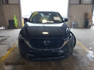 2023 Mazda CX-5 S Premium Plus z VIN JM3KFBEM8P0130642, wystawiony jako IAAI lot #41879316 z przebiegiem Nie podano mil oraz . Historia ofert i sprzedaży dostępna na DreamBid. Obrazek 11.