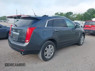 2012 Cadillac SRX Luxury Collection with VIN 3GYFNAE3XCS570616, listed as a IAAI auction lot 42030406 with 125,718 mi miles. Bid and sale history available at carsss.com. Image 4.
