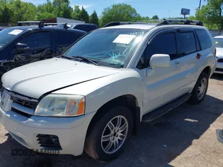 2004 Mitsubishi Endeavor Limited z VIN 4A4MM41S34E001920, wystawiony jako IAAI lot #42172909 z przebiegiem 196 140 mil mil oraz . Historia ofert i sprzedaży dostępna na DreamBid. Obrazek 2.