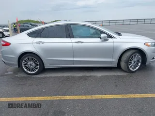 2013 Ford Fusion SE with VIN 3FA6P0H98DR253944, listed as a IAAI auction lot 42525128 with 104,081 mi miles and . Bid and sale history available at DreamBid. Image 13.