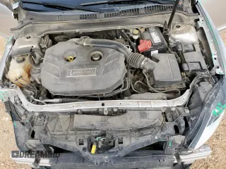 2014 Lincoln MKZ z VIN 3LN6L2G90ER815819, wystawiony jako Copart lot #61189515 z przebiegiem 101 148 mil mil oraz Szkoda całkowita • Salvage title. Historia ofert i sprzedaży dostępna na DreamBid. Obrazek 11.